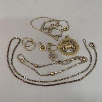 A collection of bracelets and part jewellery in 9ct. gold and yellow metal (test as as 9ct gold),