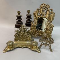 Victorian gilt metal cable mirror cast with figures and cherubs in a pierced frame together with a