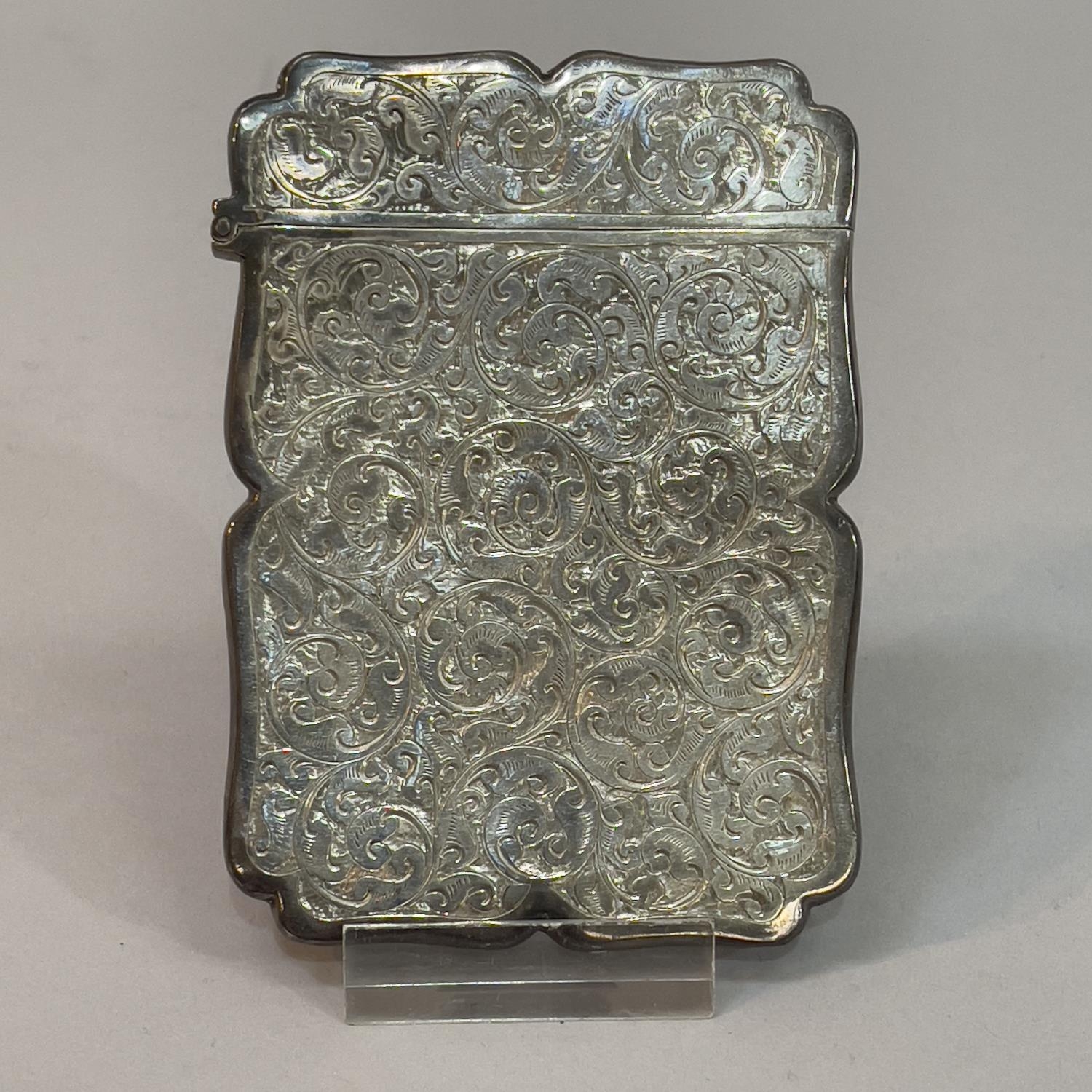 A Victorian silver card case, Birmingham 1894, Colen Hewer, Cheshire, foliate scroll engraved with - Image 2 of 3