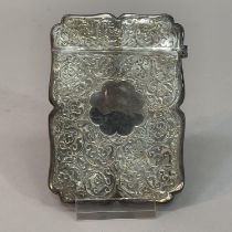 A Victorian silver card case, Birmingham 1894, Colen Hewer, Cheshire, foliate scroll engraved with