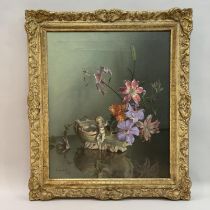 Evans mid 20th Century still life of lilies held in a vase with cherub mount, oil on canvas,