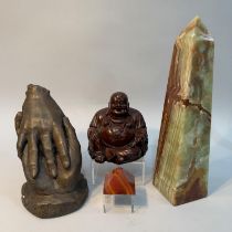 A bronzed plaster model of two hands touching marked KAR to verso, an onyx obelisk, a small
