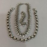 A Victorian festoon silver necklace of pierced star, bead and pear drop links A/F together with a