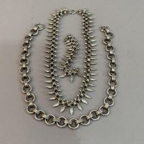 A Victorian festoon silver necklace of pierced star, bead and pear drop links A/F together with a