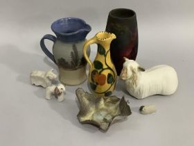 A collection of Studio pottery including painted jug by K Waller, another by Earthworks pottery of