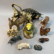 A ceramic figure of a charging bull A/F, a filled pewter bull, a pot figure of a frog together