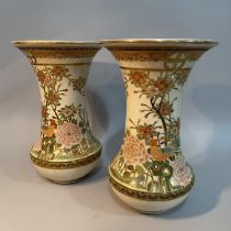 A pair of Japanese early 20th century flared rim vases, having gilt and enamel decoration of birds