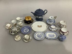 A collection of cabinet and miniature cups and saucers, blue and white dolls tea ware, Wedgwood