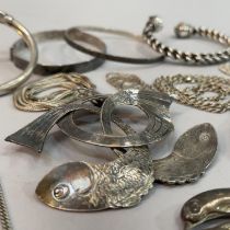 A collection of silver and white metal jewellery (this metal tests as silver) including bangles,