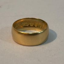 A Victorian 18ct. gold wedding ring, engraved to the inside “God Abide, Grant Us Thy Love” in Gothic