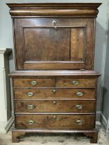 A 19th century continental mahogany secretaire abbatant