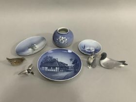 A collection of Royal Copenhagen including cat, mallard, gull, wren, a vase painted with blossom and