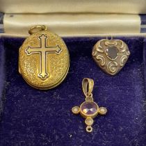 A Victorian oval locket set with am enamelled Fleurée cross in royal blue cloisonné, embossed on a