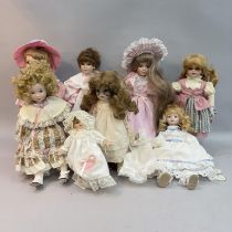 Nine soft bodied dolls with bisque heads including two Alberon examples