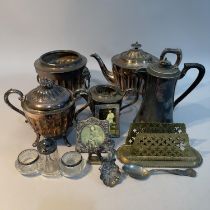 A silver plated tea service comprising teapot, hot water pot, milk jug and cachepot having fluted