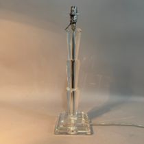A crystal glass table lamp by Aimbry Ltd, the triple stepped column on a square stepped base, 48.5cm