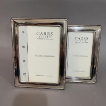 A pair of modern sterling silver photograph frames of graduated size, by Carrs of Sheffield, 19cm