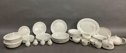 A Poole pottery Freesia dinner service comprising eight dinner plates, seven bowls, six cups and