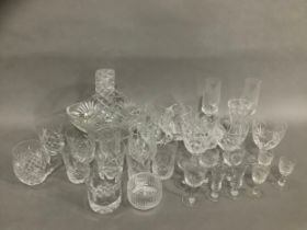 A suite of mixed cut glasses comprising five hocks, four flutes, four red wines, four tumblers,