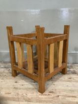 Am oak planter with railed sides and on stile feet, 46cm high