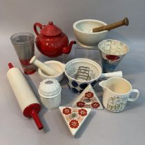 Retro kitchenalia including enamelware teapot, two mortar and pestles, two measures, a rolling