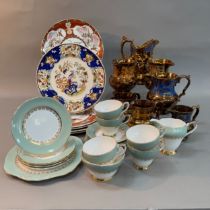 Seven copper lustreware jugs and a Royal Sutherland duck egg and gilt tea service for five and six