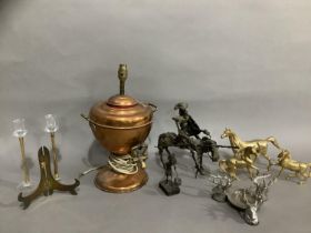 A copper tea urn converted to a lamp, two wire work figures of Don Quixote, a candle holder formed