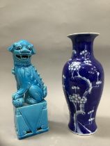 A Chinese ceramic figure of a dog of fo in a turquoise glaze and a blue and white baluster vase