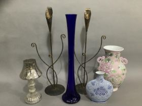 A pink Chinese vase, a pale and dark blue bottle vase, a dark blue glass fluted vase, two metal