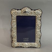 A modern sterling silver photograph frame by Carrs of Sheffield boxed, as new, 21cm x 15cm