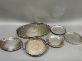 A silver plated on copper galleried tray with etched centre, a twin handles tray with gadroon rim,