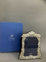 A modern sterling silver photograph frame, by Carrs of Sheffield, boxed, as new, 20cm x 25cm