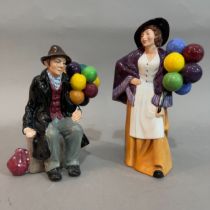 A Royal Doulton figure 'Balloon Lady' 21cm high and 'The Balloon Man' 19cm high