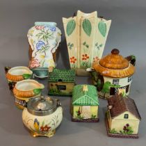 Art Deco Arthur Wood wall pocket, three Japanese preserve pots formed as cottages, ceramic teapot,