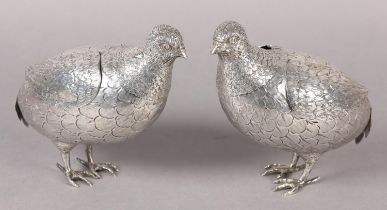 A PAIR OF SILVER PARTRIDGE DECANTERS, Chester 1909 German import mark for B Muller & Son,