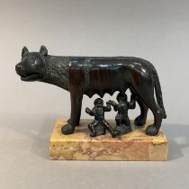 A LATE 19TH CENTURY BRONZE GROUP OF ROMULUS AND SHE-WOLF, on marble plinth, 9.5cm high (Shipping