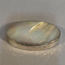 A LATE 18TH CENTURY SILVER AND MOTHER-OF-PEARL SNUFF BOX, oval, the sides embossed with a trellis