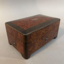 A BURR WALNUT AND CROSSBANDED MUSICAL BOX, early 20th century, playing six airs, the wind-up