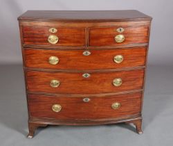 A LATE GEORGE III MAHOGANY BOW FRONTED CHEST of two short and three long graduated cockbeaded
