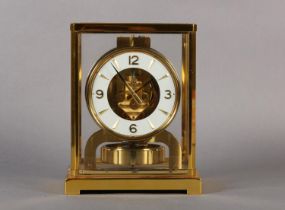 A JAEGER-LE COULTRE ATMOS CLOCK in rectangular five light case, circular white dial with gilt Arabic