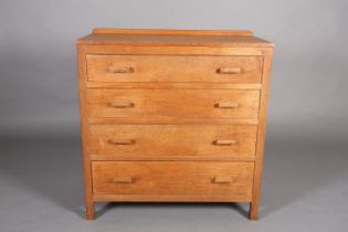 DEREK SLATER OF CRAYKE 'LIZARD MAN', an oak chest, having a short raised back over four long drawers