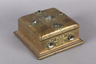 A VICTORIAN BRASS GAMES BOX COLLET SET WITH BANDED AGATE CABOCHONS IN STRAPWORK TO THE LID AND