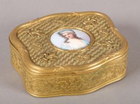 A 19TH CENTURY FRENCH GILT METAL CASKET BOX, of square serpentine form, the side panels in relief