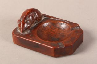 THOMPSON OF KILBURN 'MOUSEMAN', an early oak ashtray carved in high relief with a mouse, of rich