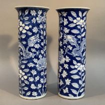 A PAIR OF LATE 19TH CENTURY CHINESE BLUE AND WHITE SLEEVE VASES, Qing, painted with opposing four