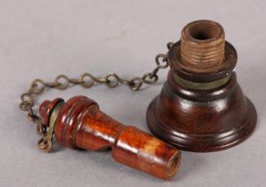 A 19TH CENTURY SHIP'S VOICE PIPE MOUTHPIECE, turned hardwood with brass collars and chain, 8.5cm