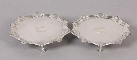 A PAIR OF GEORGE III SILVER SALVERS, London 1767 for John Cormick, circular with shell and