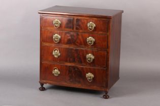 A MID 19TH CENTURY FIGURED MAHOGANY NEST of two short and three long graduated drawers, with gilt