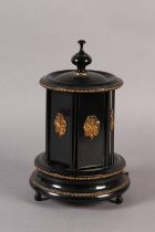 A 19TH CENTURY FRENCH EBONISED AND GILT METAL MOUNTED MUSICAL WORK CAROUSEL PLAYING TWO AIRS, the