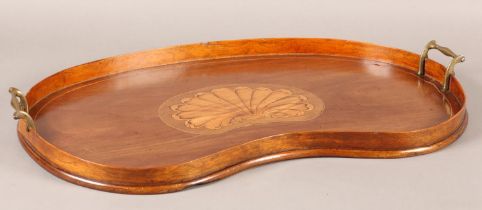 AN EDWARD VII MAHOGANY AND SATINWOOD INLAID TWO HANDLED TRAY of kidney shape with gallery, inlaid to